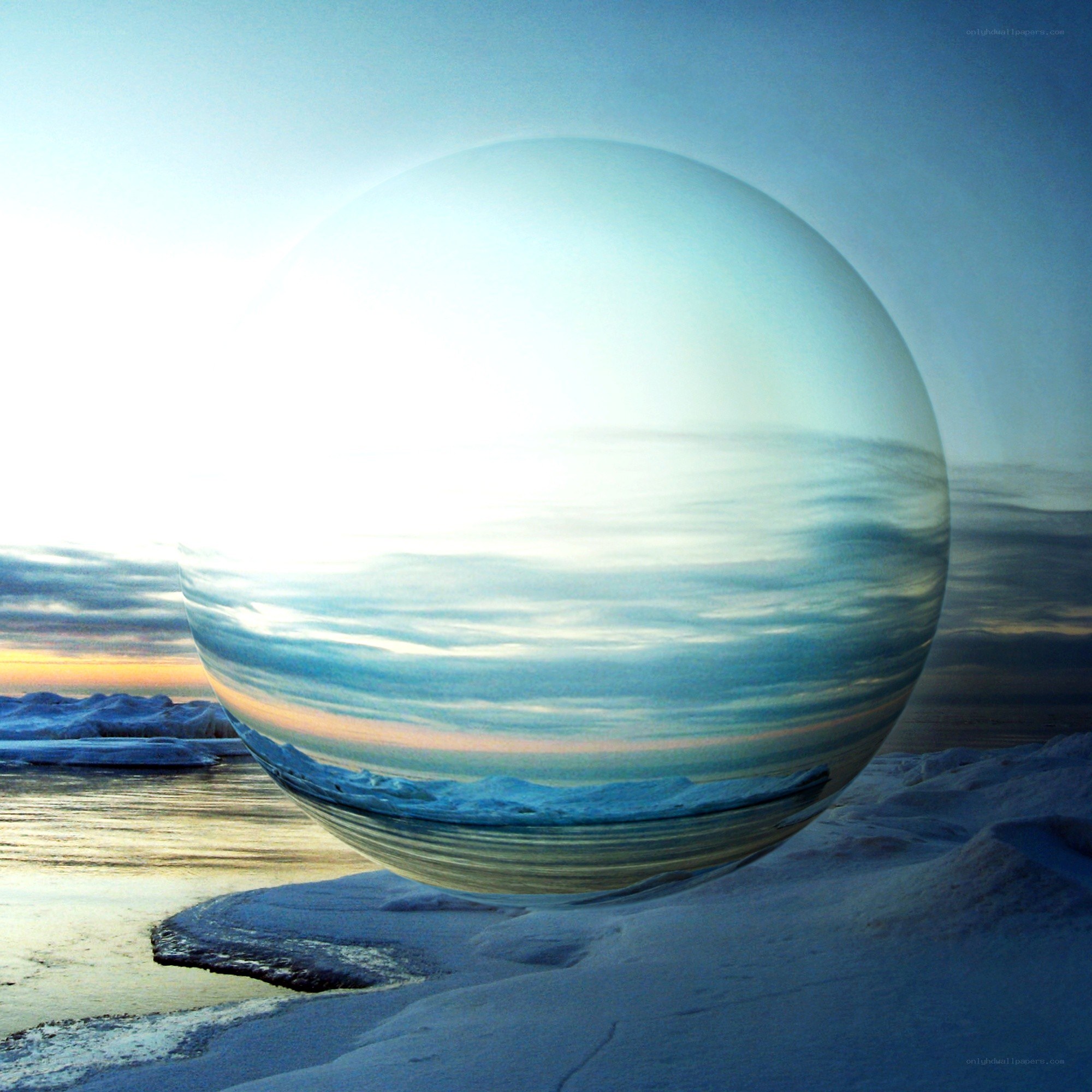 Sphere reflecting arctic landscape