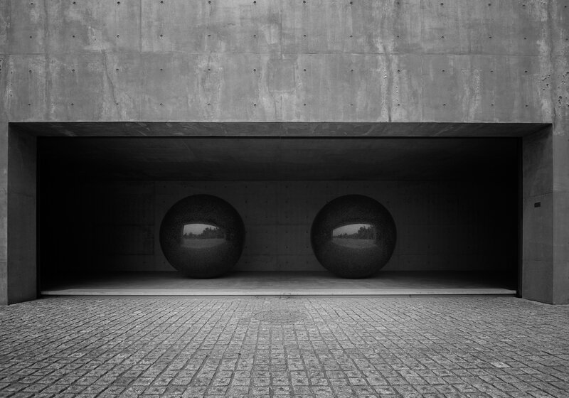Spheres in a Concrete Shelter