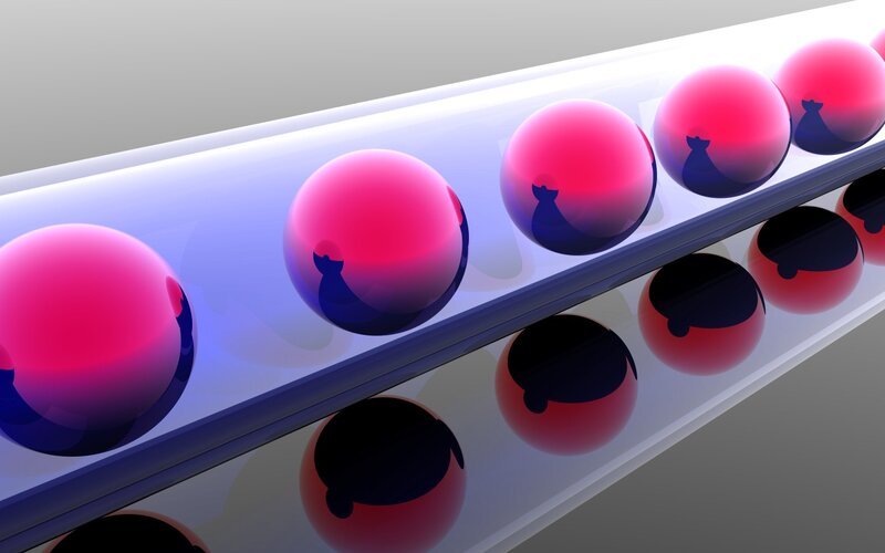 spheres in a transparent tube
