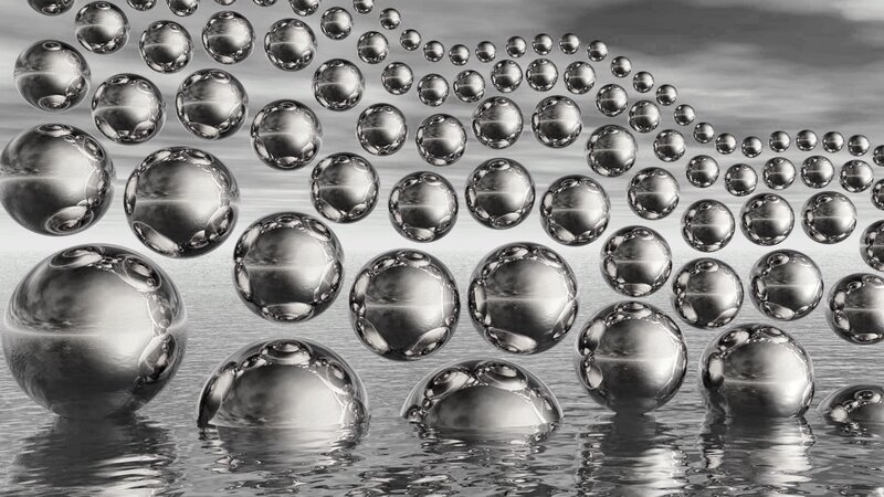 Spheres on water surface