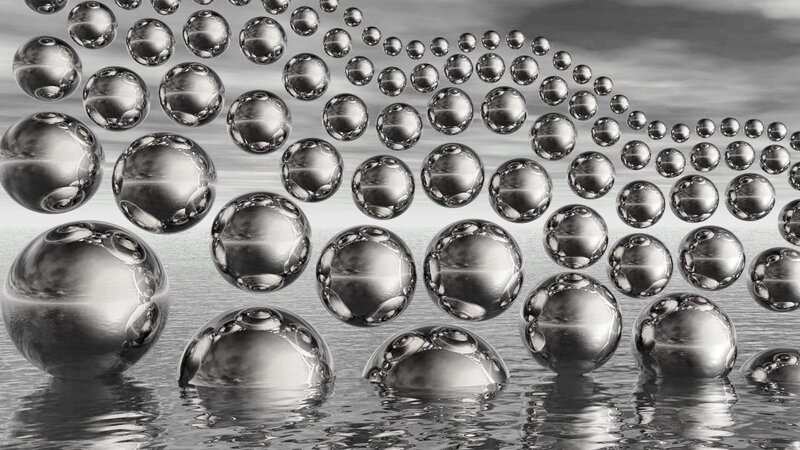 Spheres on Water Surface