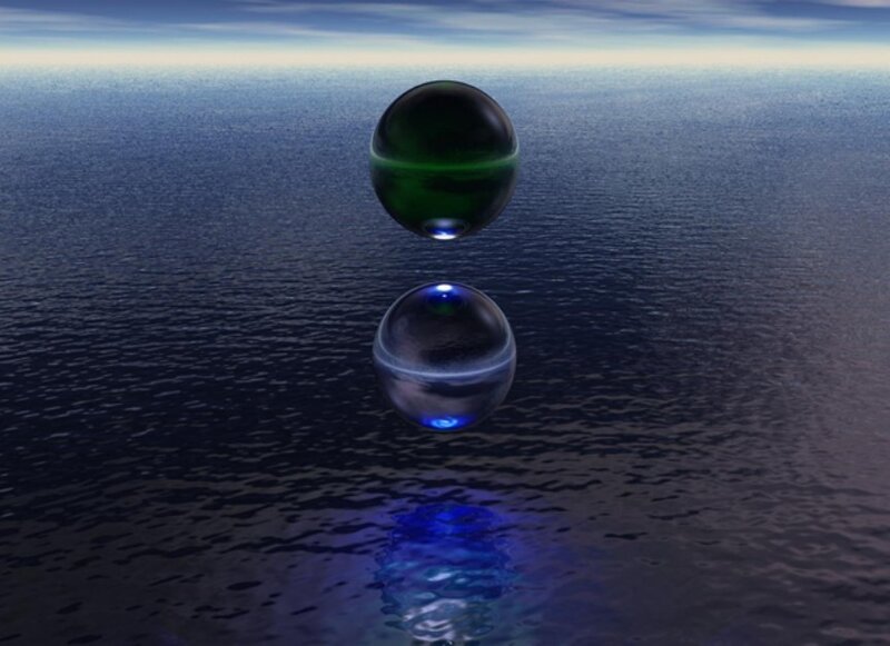 spheres over water reflection