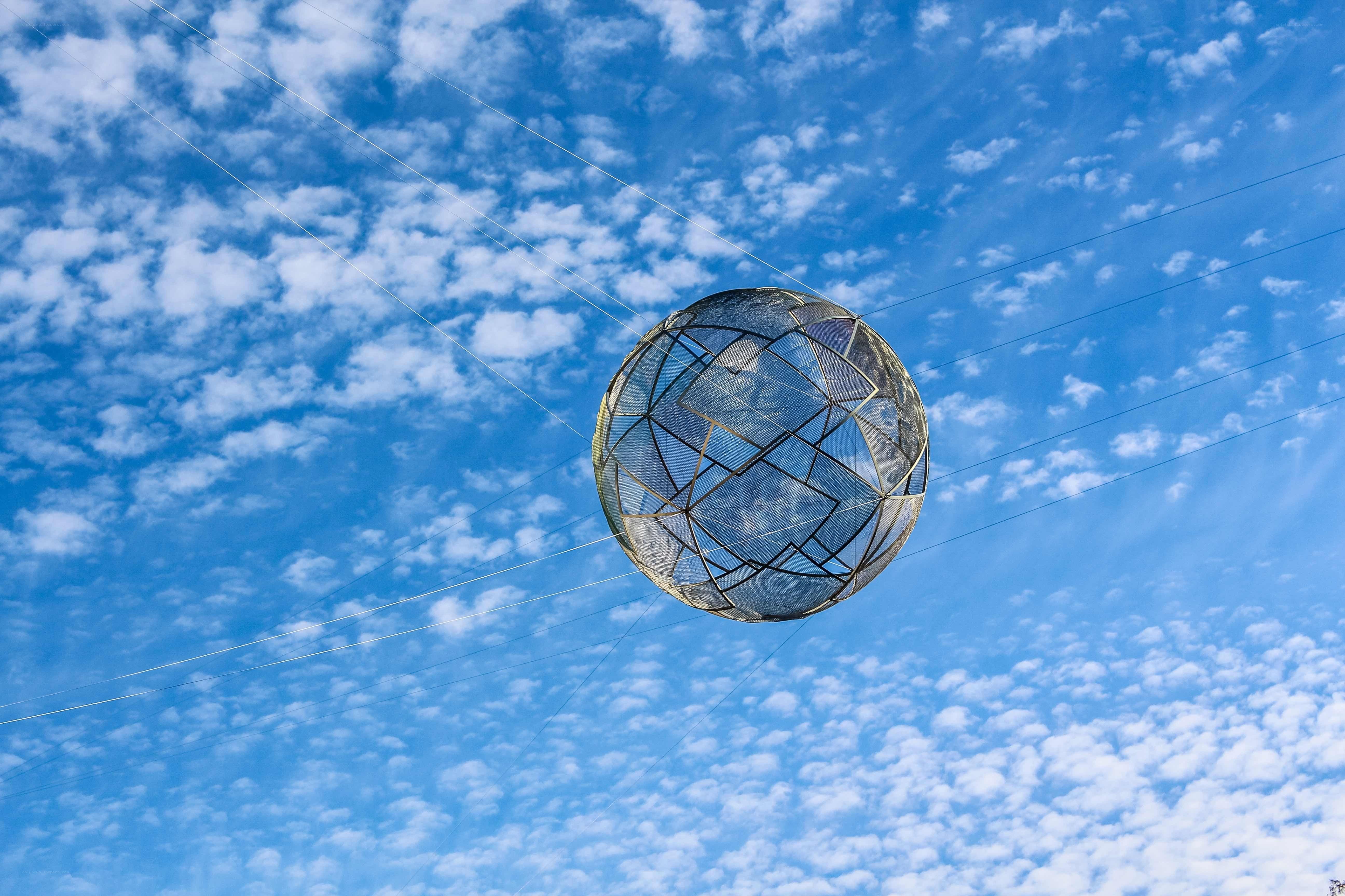 Spherical kite in blue sky