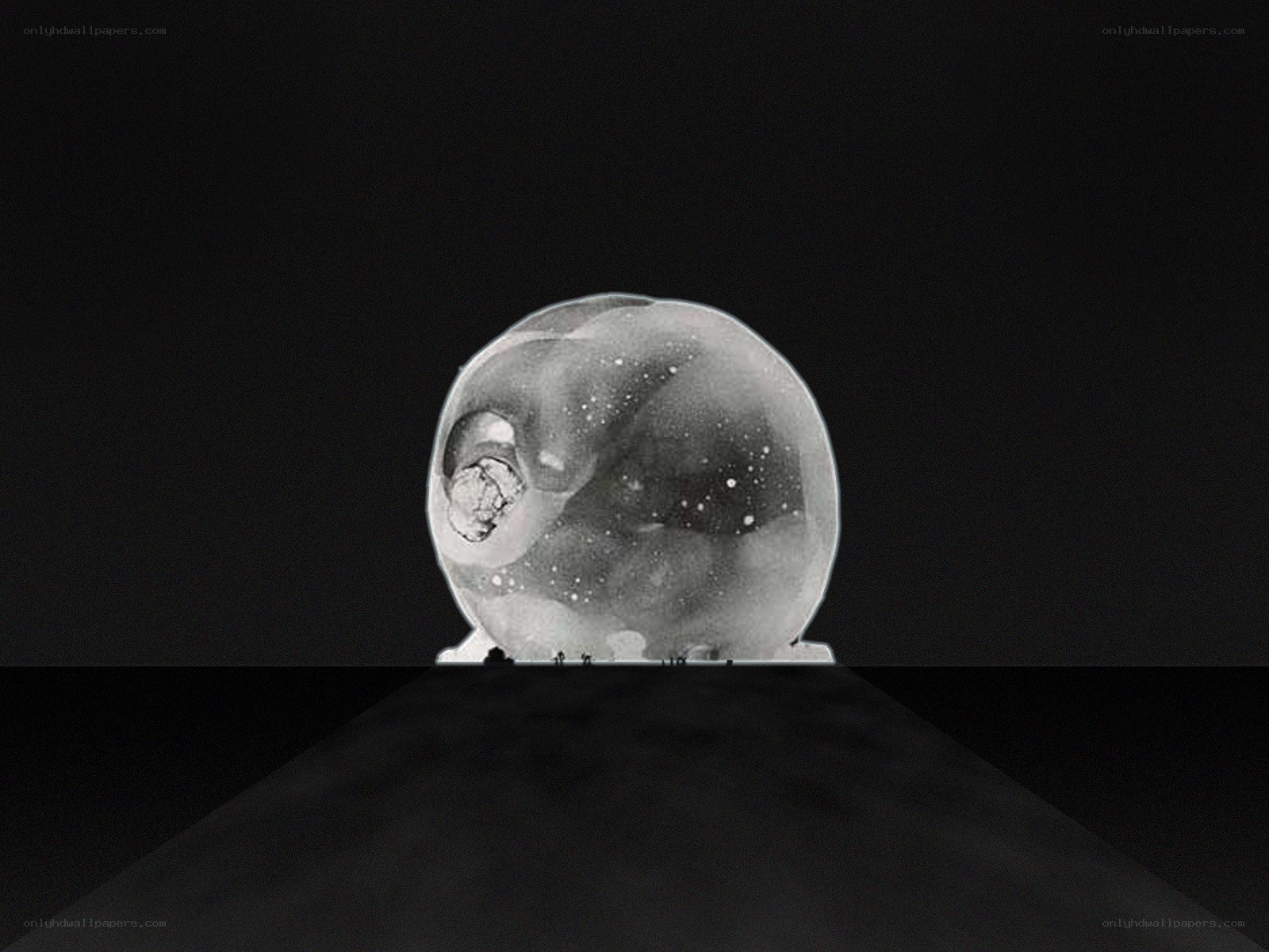 Spherical sculpture in dark space