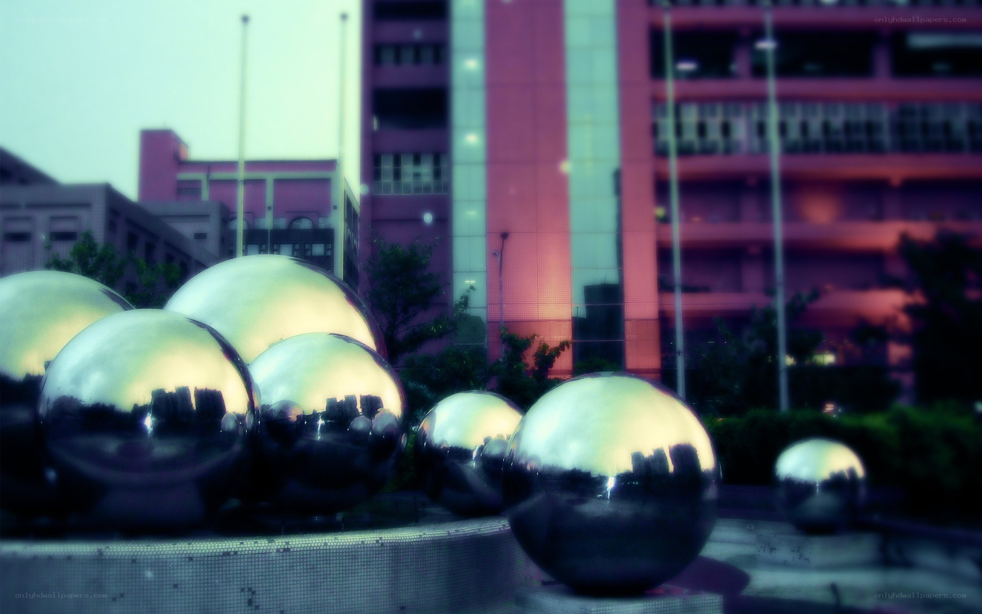 Spherical sculptures in urban setting