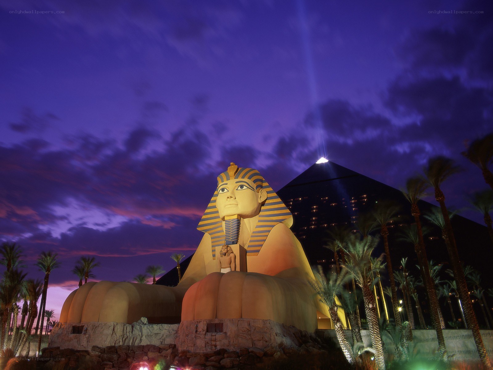 Sphinx and pyramid at dusk