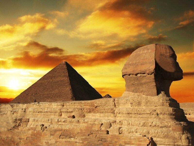 Sphinx and pyramid at sunset