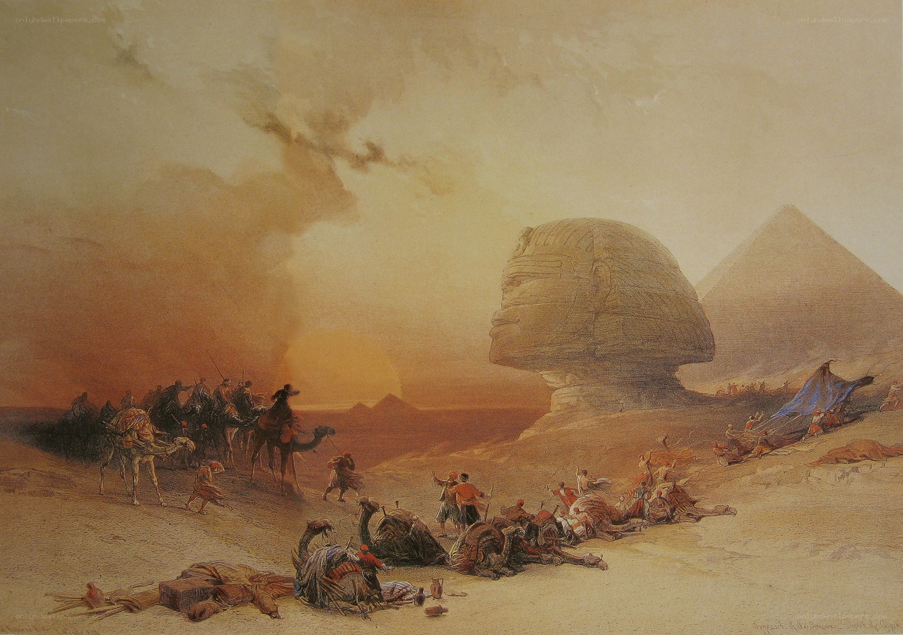 Sphinx and pyramids at sunset