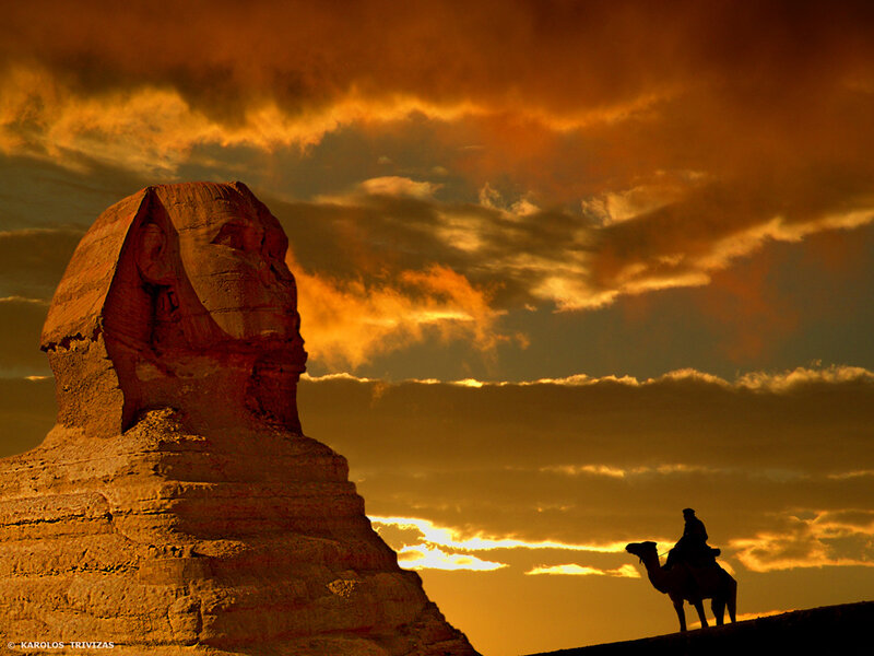 Sphinx at sunset with camel