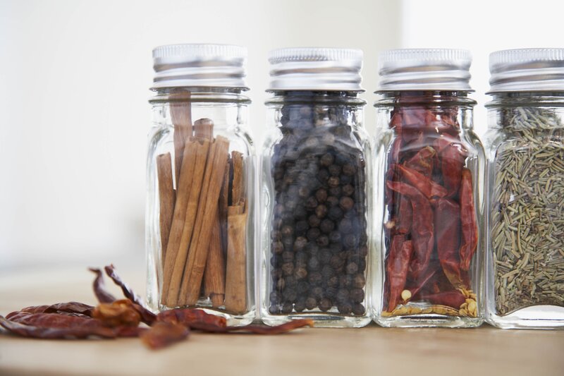 spice jars on a kitchen counter