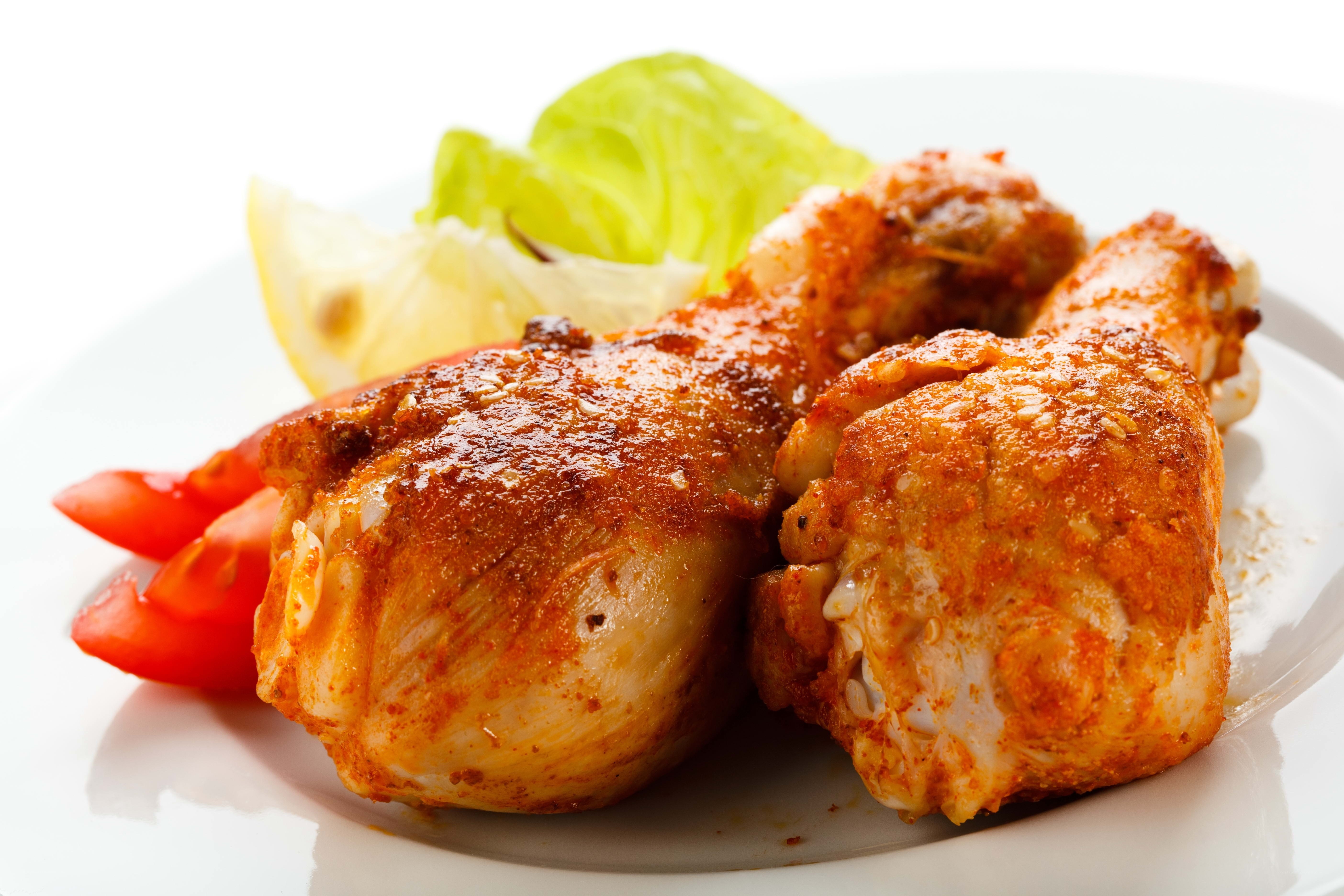 Spiced chicken drumsticks with vegetables