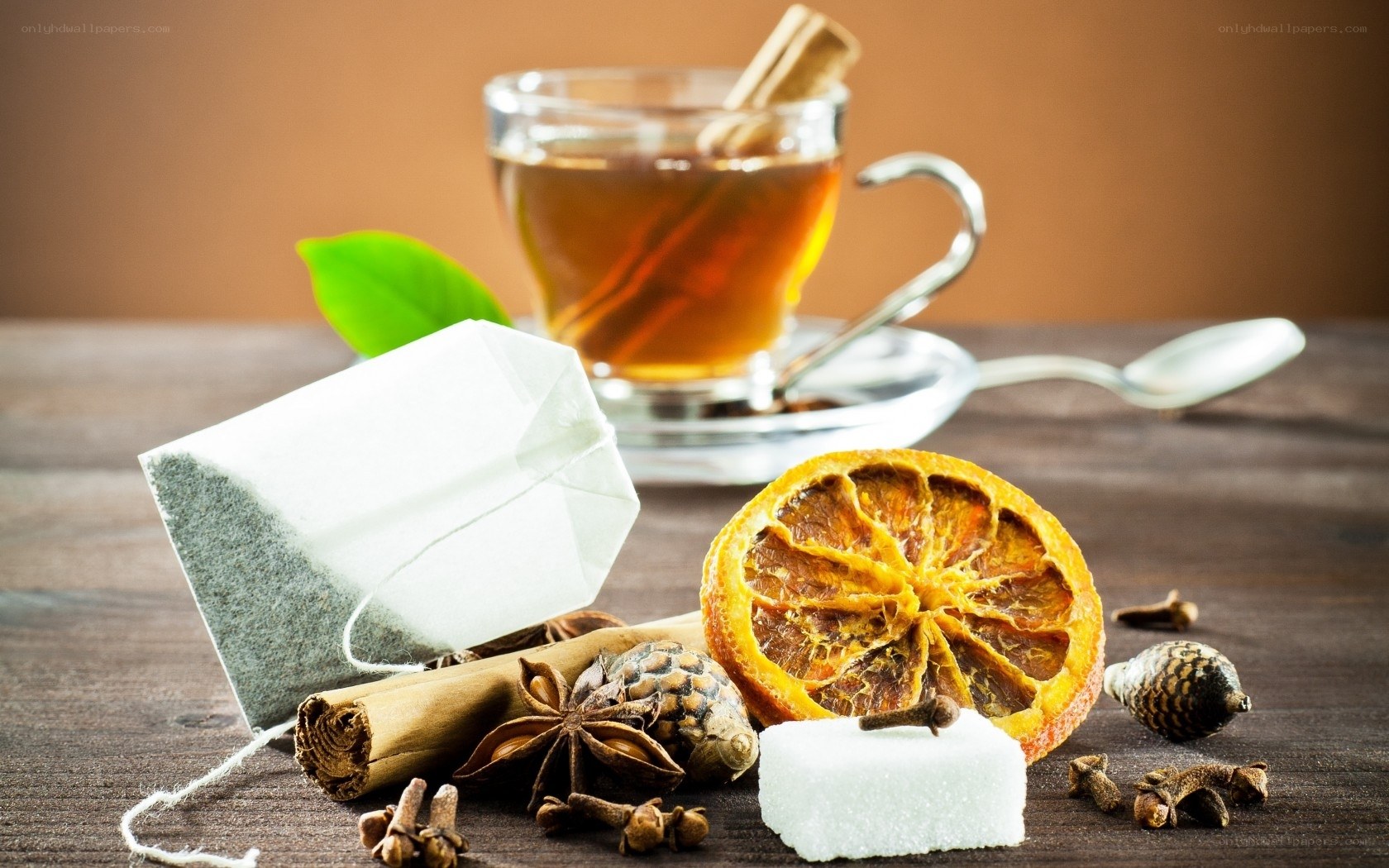 Spiced tea ingredients on wood
