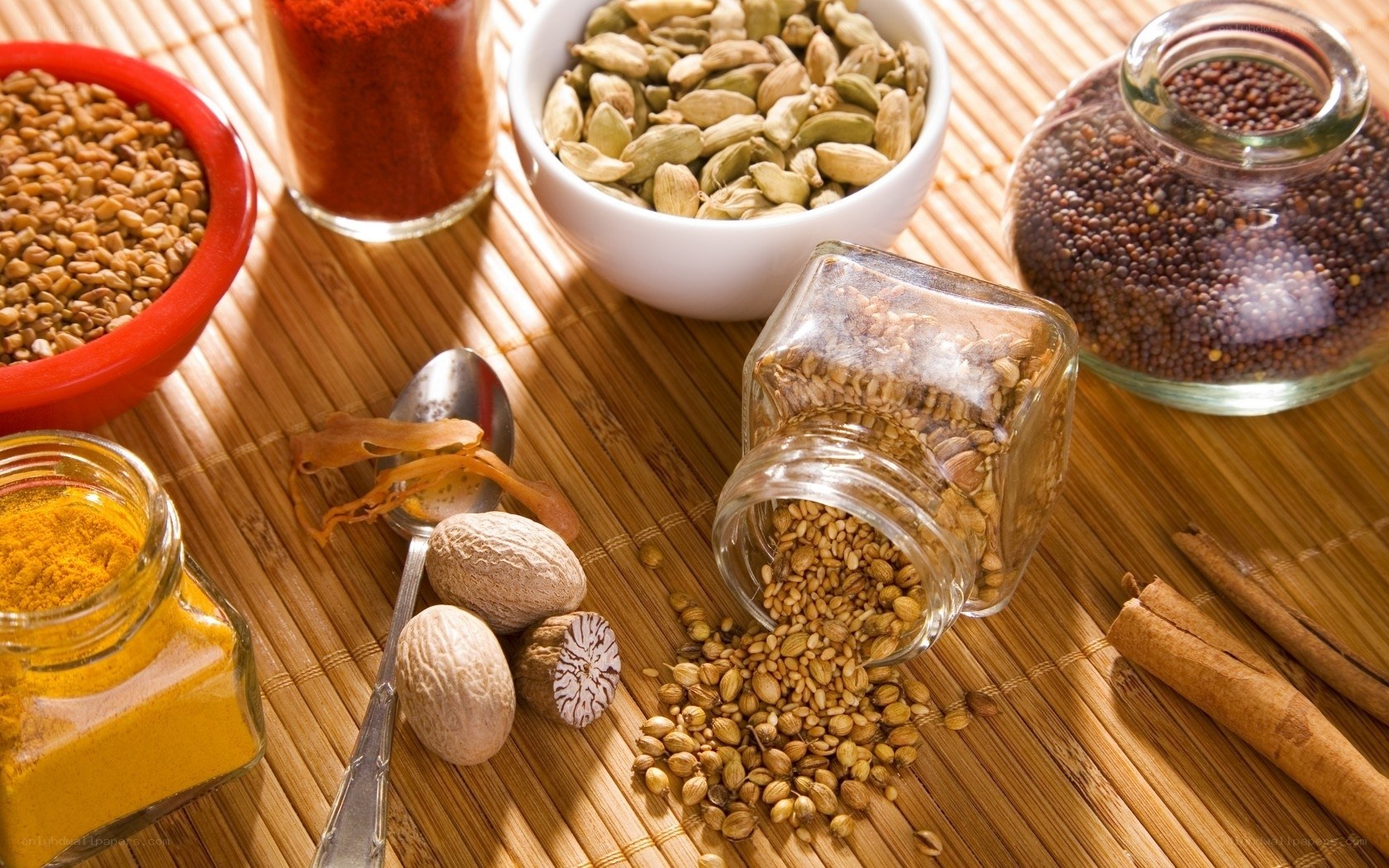 Spices and herbs on bamboo mat