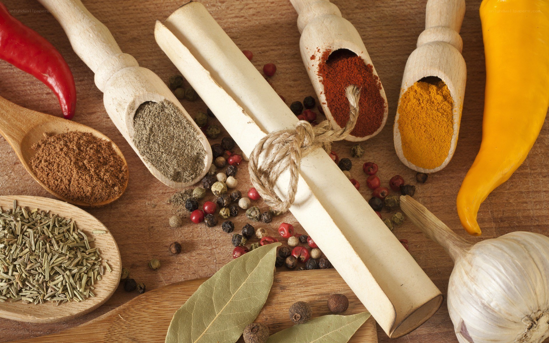 spices and herbs on wood
