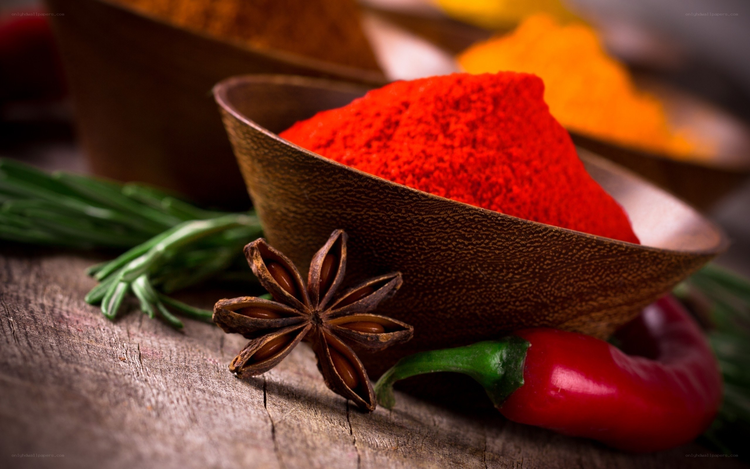 Spices and herbs on wooden table