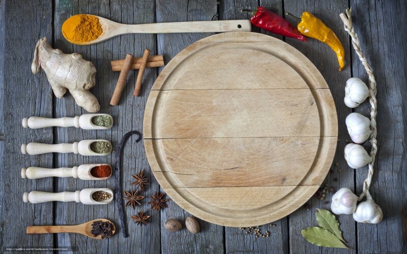 Spices and herbs on wooden table