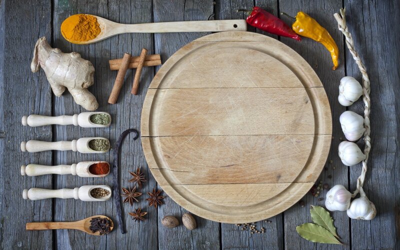 Spices and herbs on wooden table