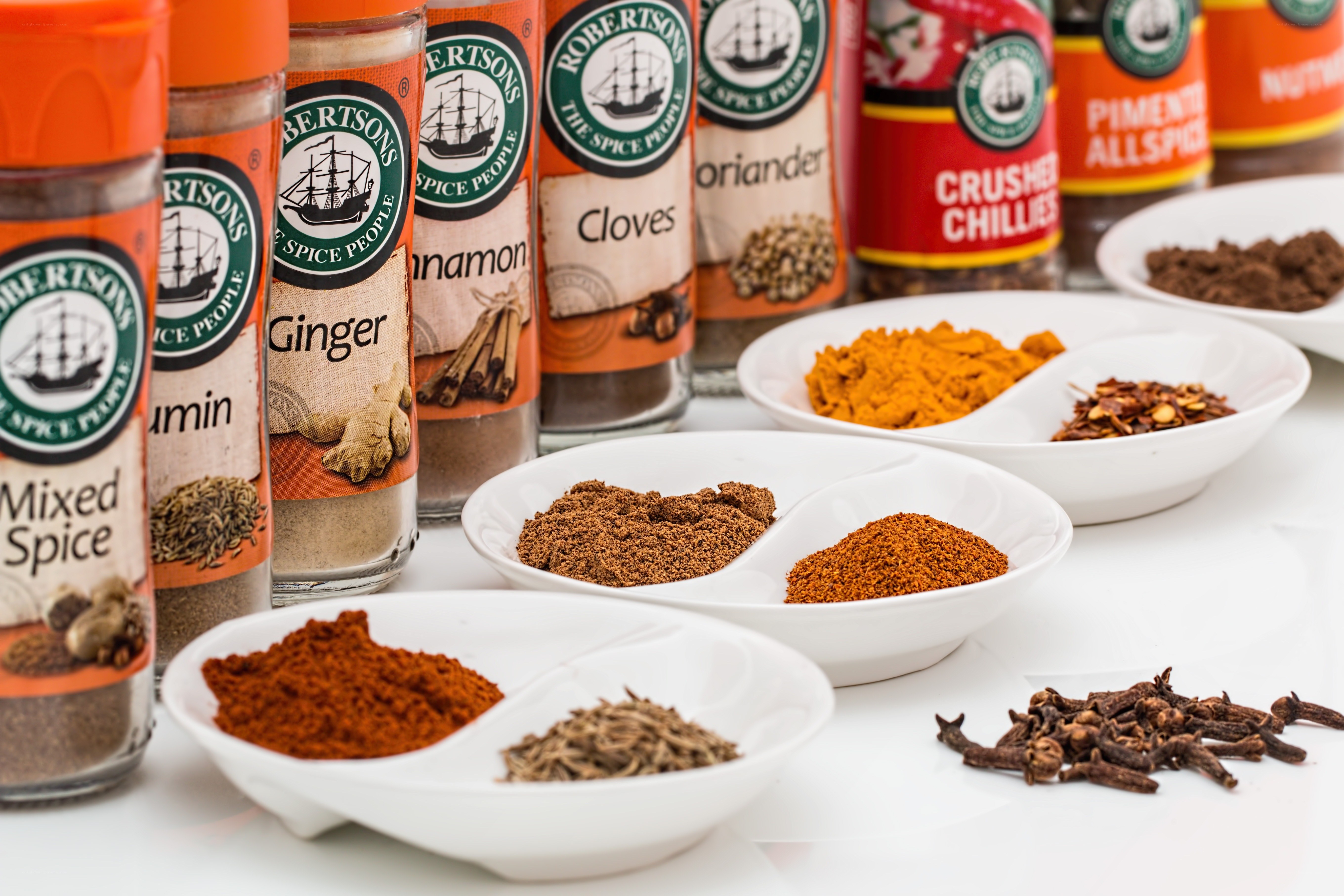 Spices in bottles and bowls