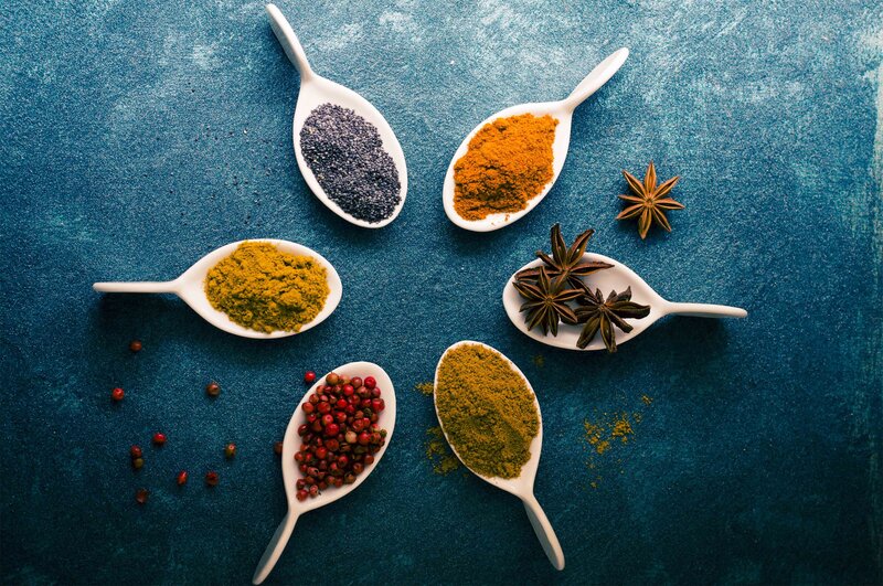 Spices in White Spoons