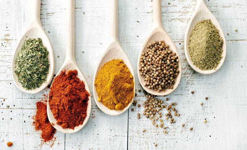 Spices in Wooden Spoons — White