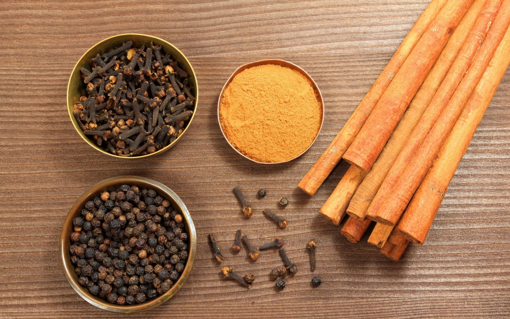 spices on wooden surface