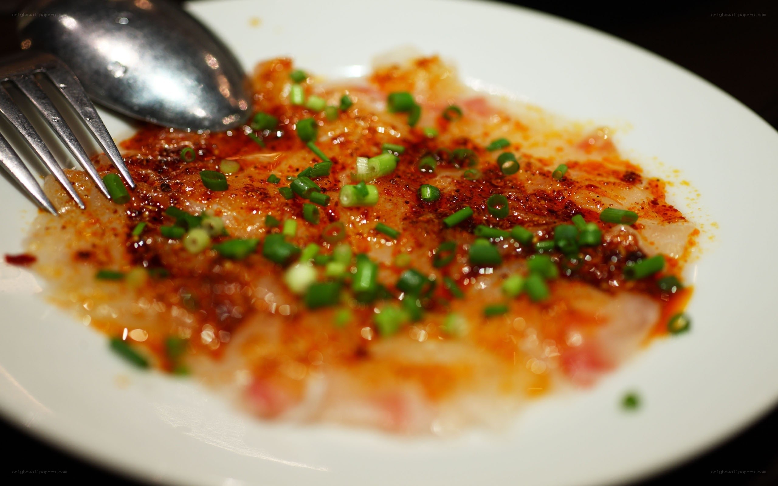 Spicy fish dish with green onions