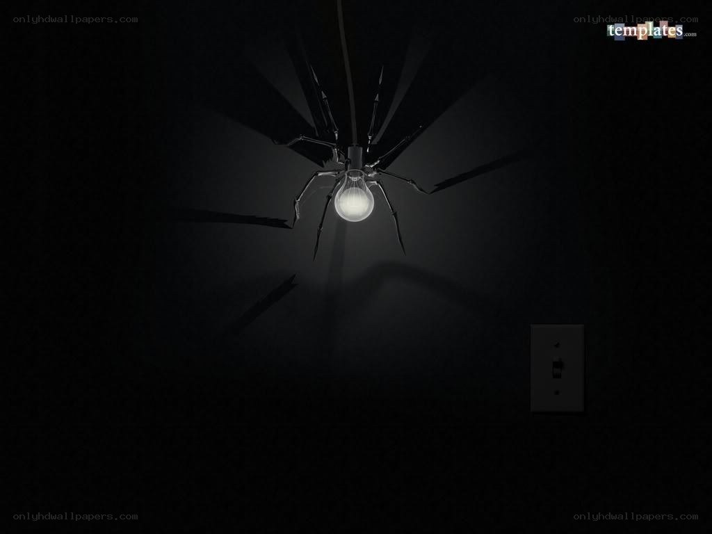 spider light fixture in dark room