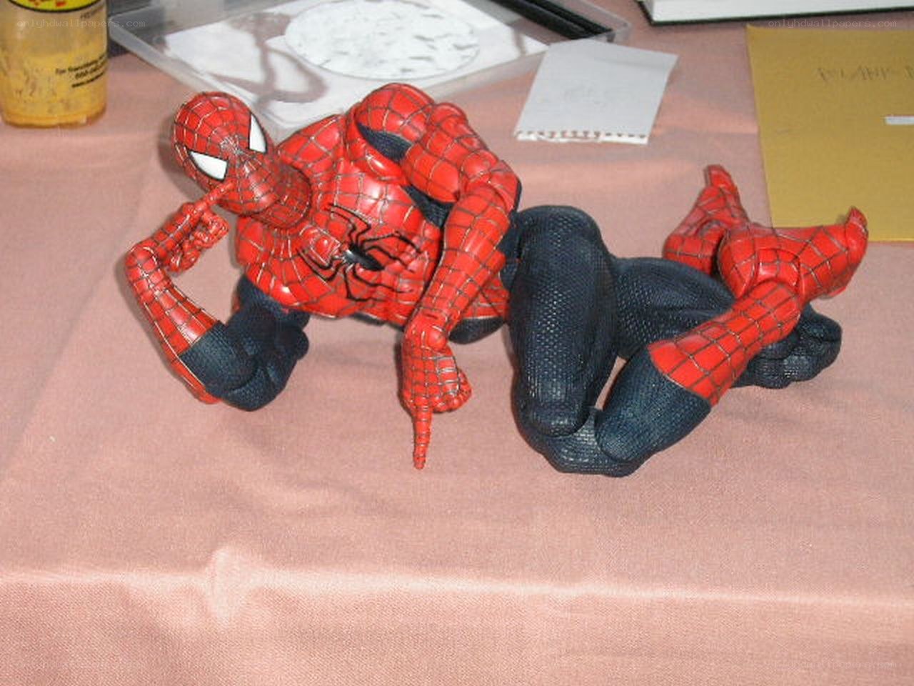 Spider-Man action figure on table