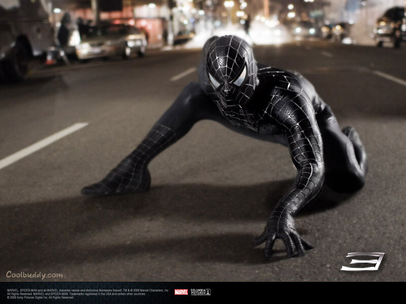Spider-Man in black suit on street