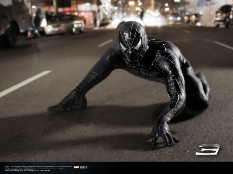 Spider-Man in black suit on street