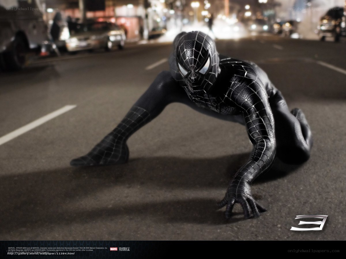 Spider-Man in black suit on street