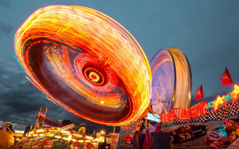 Spinning Carnival Ride — Orange, Dramatic, Night, Photograph