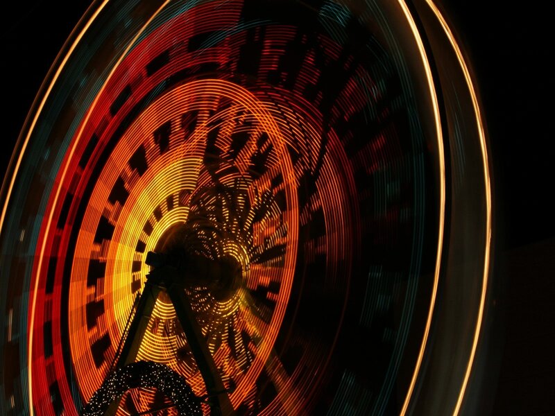 Spinning lights of a Ferris wheel