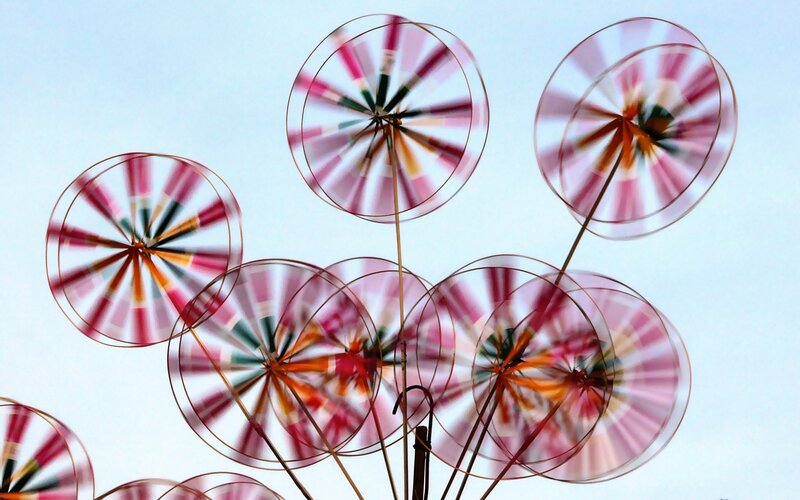 Spinning pinwheels in motion