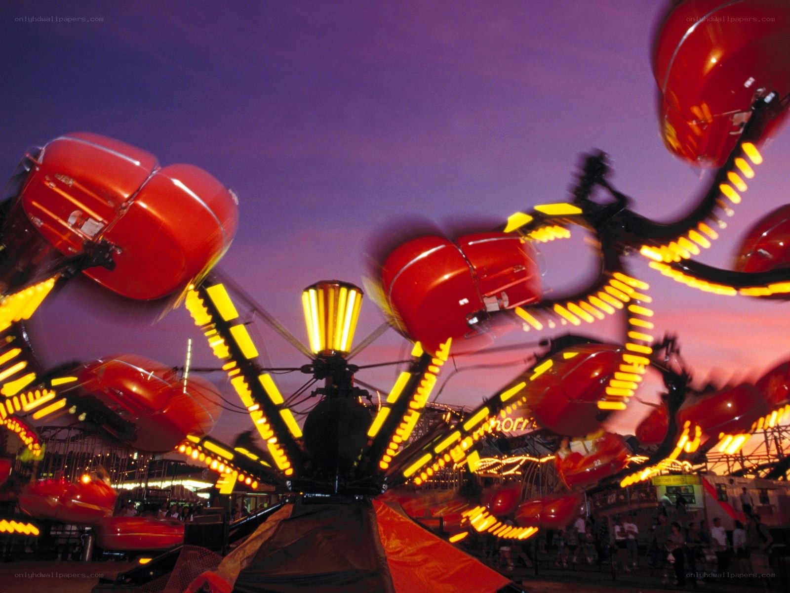 Spinning ride at dusk
