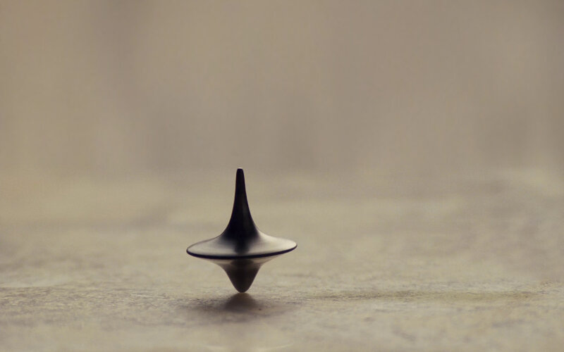 spinning top on a surface