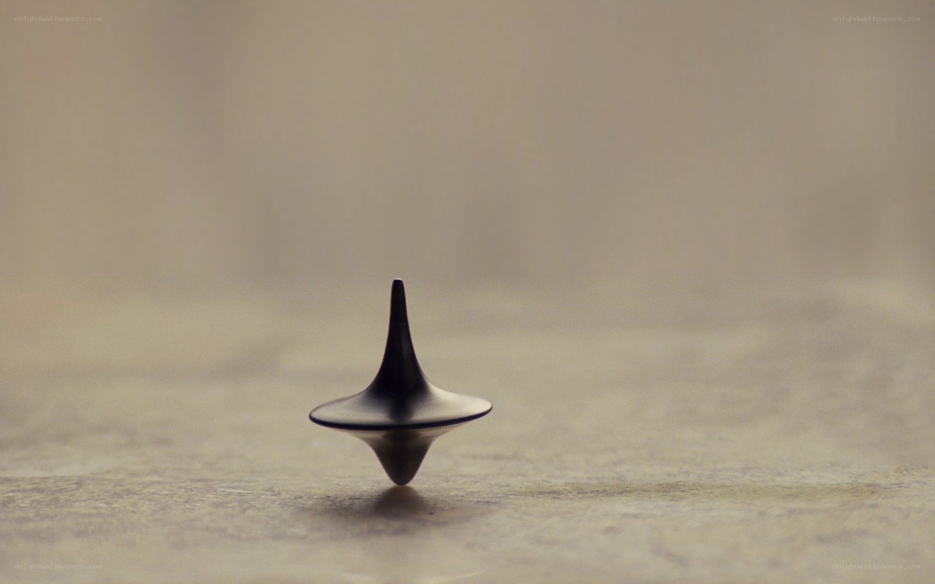 spinning top on a surface