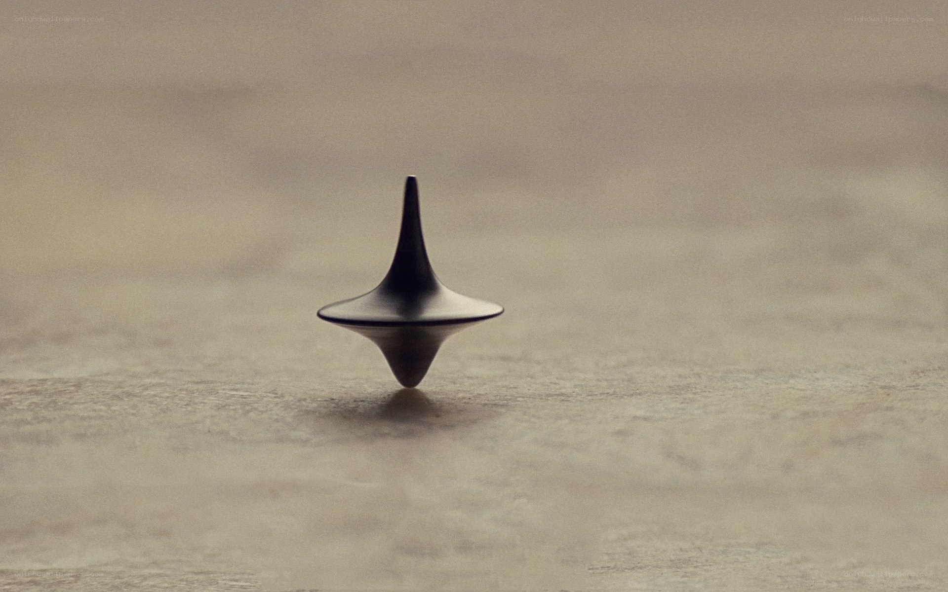 Spinning top on a surface