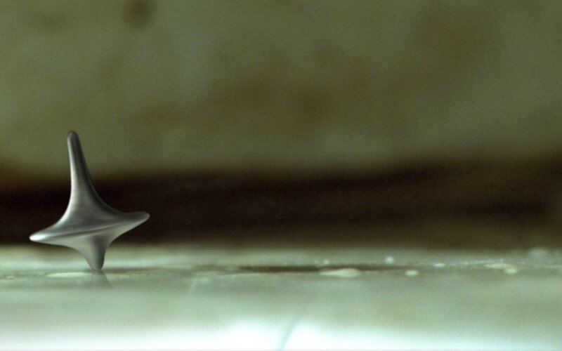 Spinning top on a surface