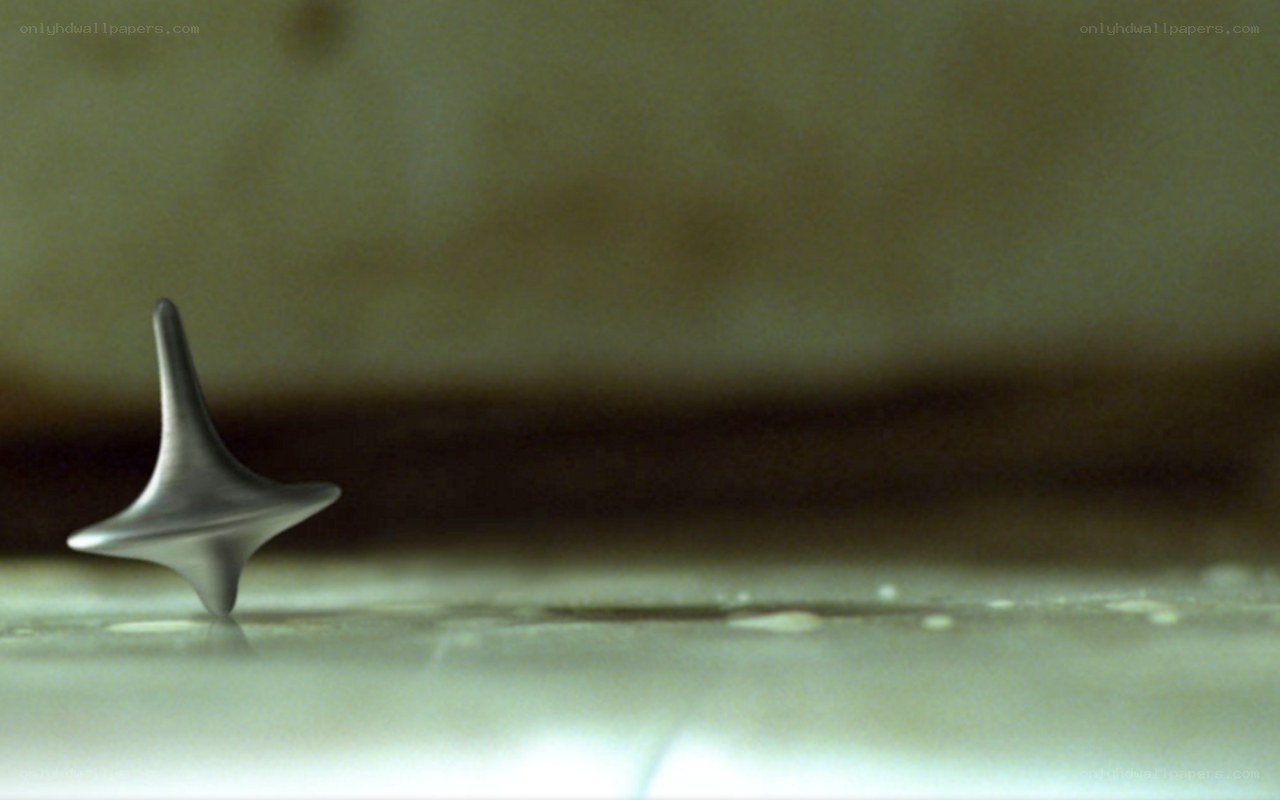 Spinning top on a surface