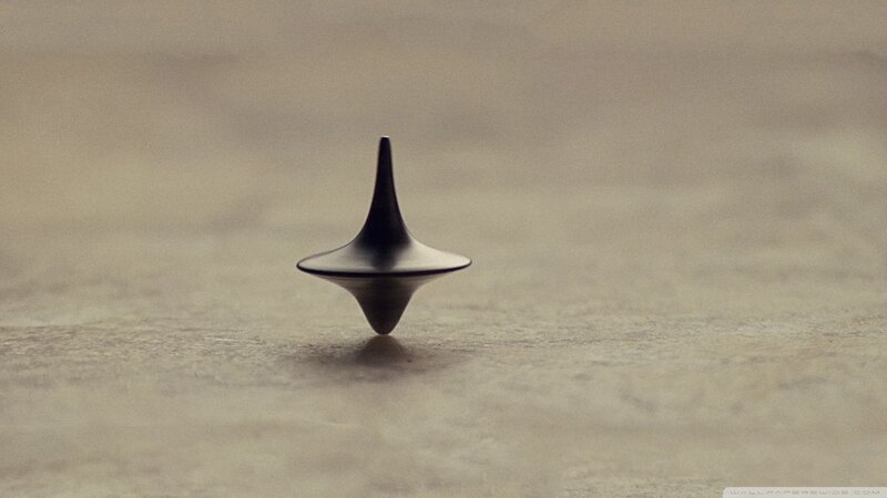 Spinning Top on Surface — Gray, Calm