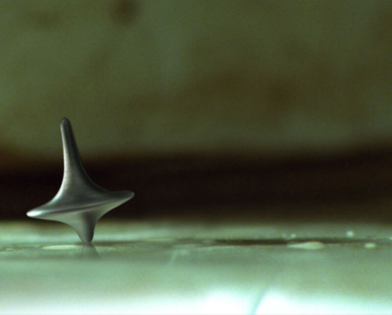 spinning top on surface