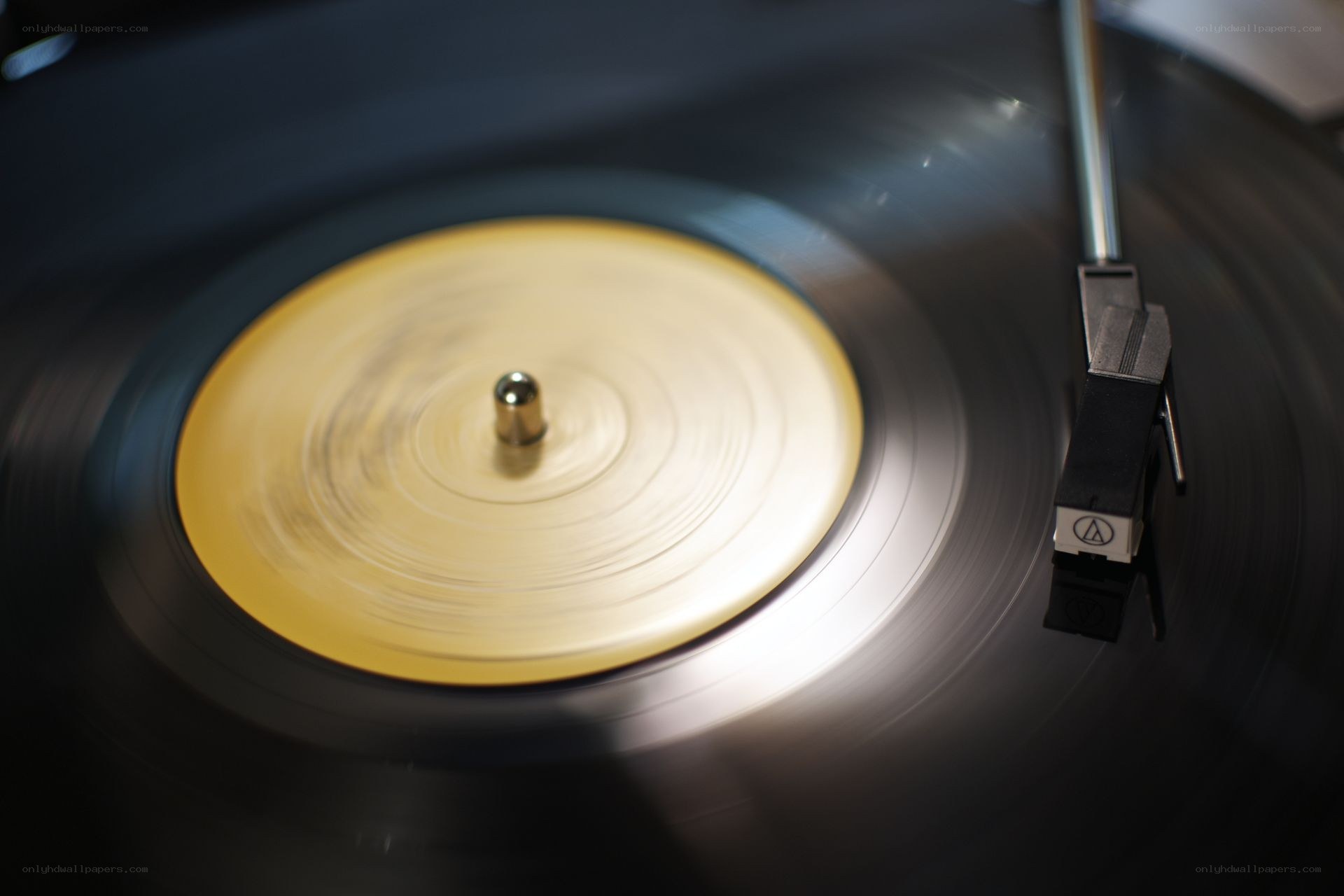 Spinning vinyl record on turntable