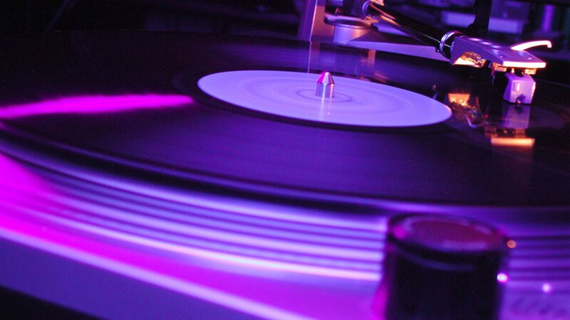 Spinning vinyl record player