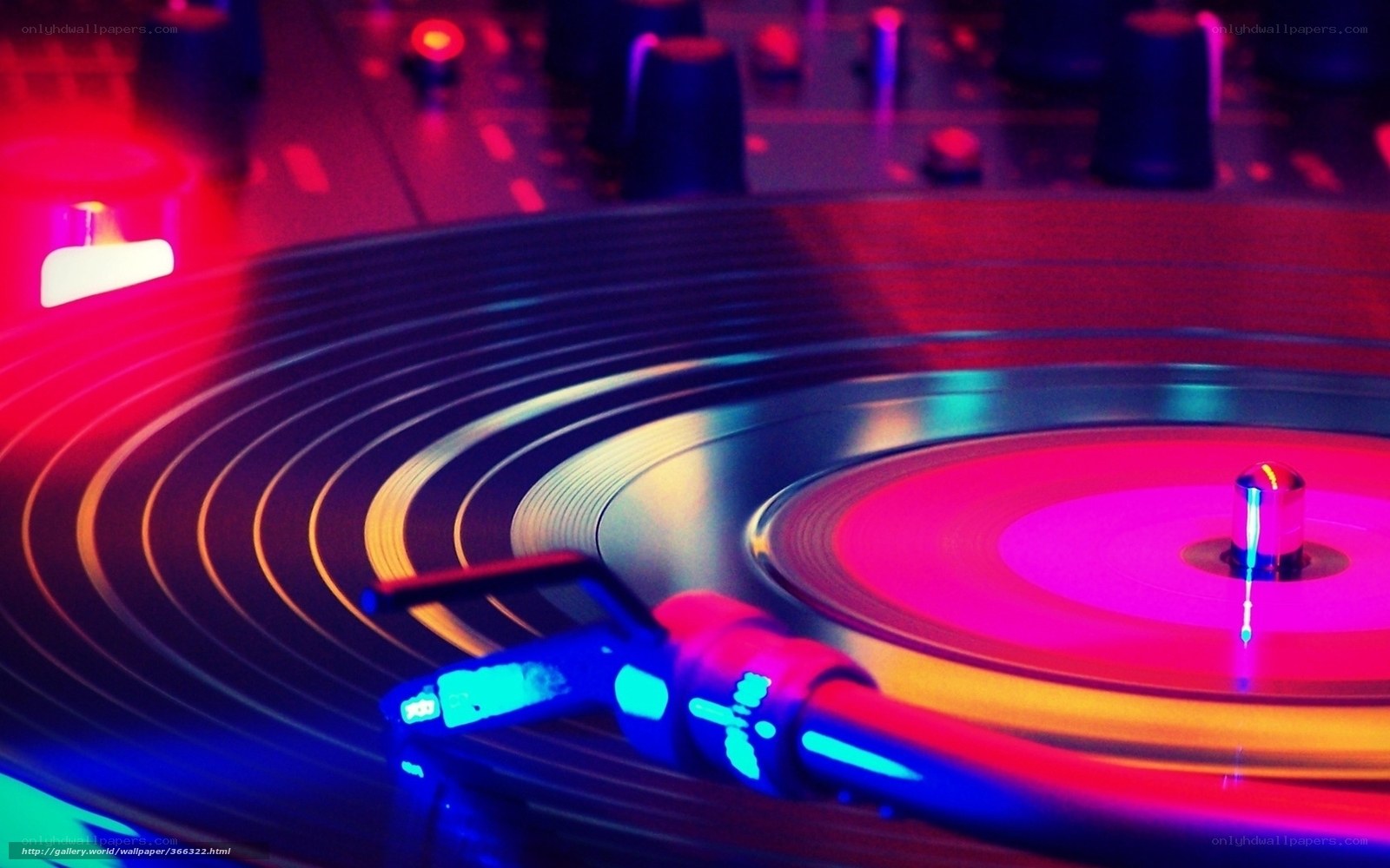 Spinning vinyl record under lights