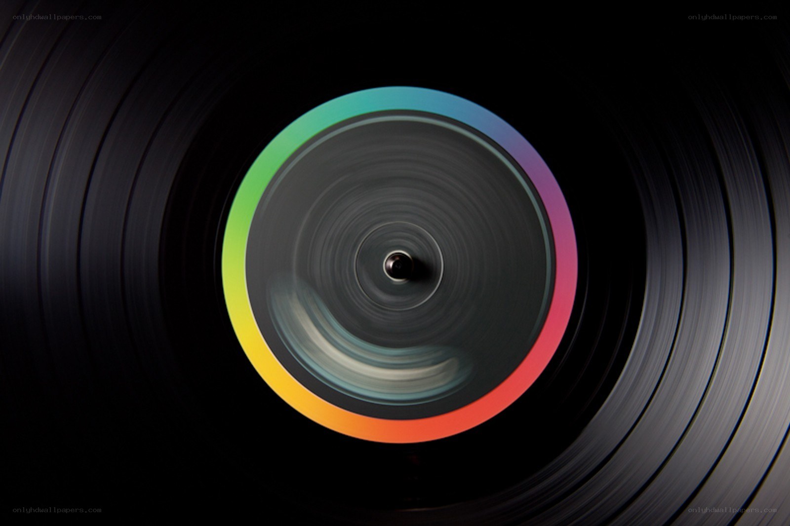 Spinning vinyl record with rainbow ring