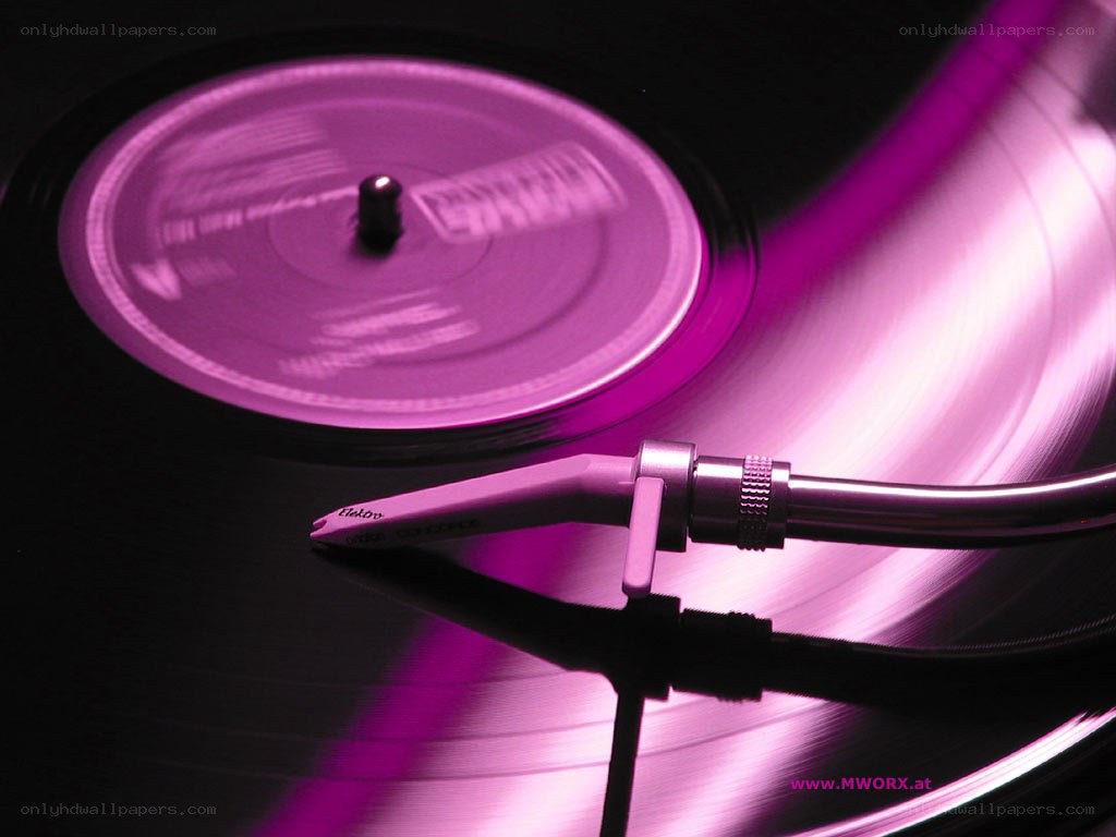 Spinning vinyl record with turntable