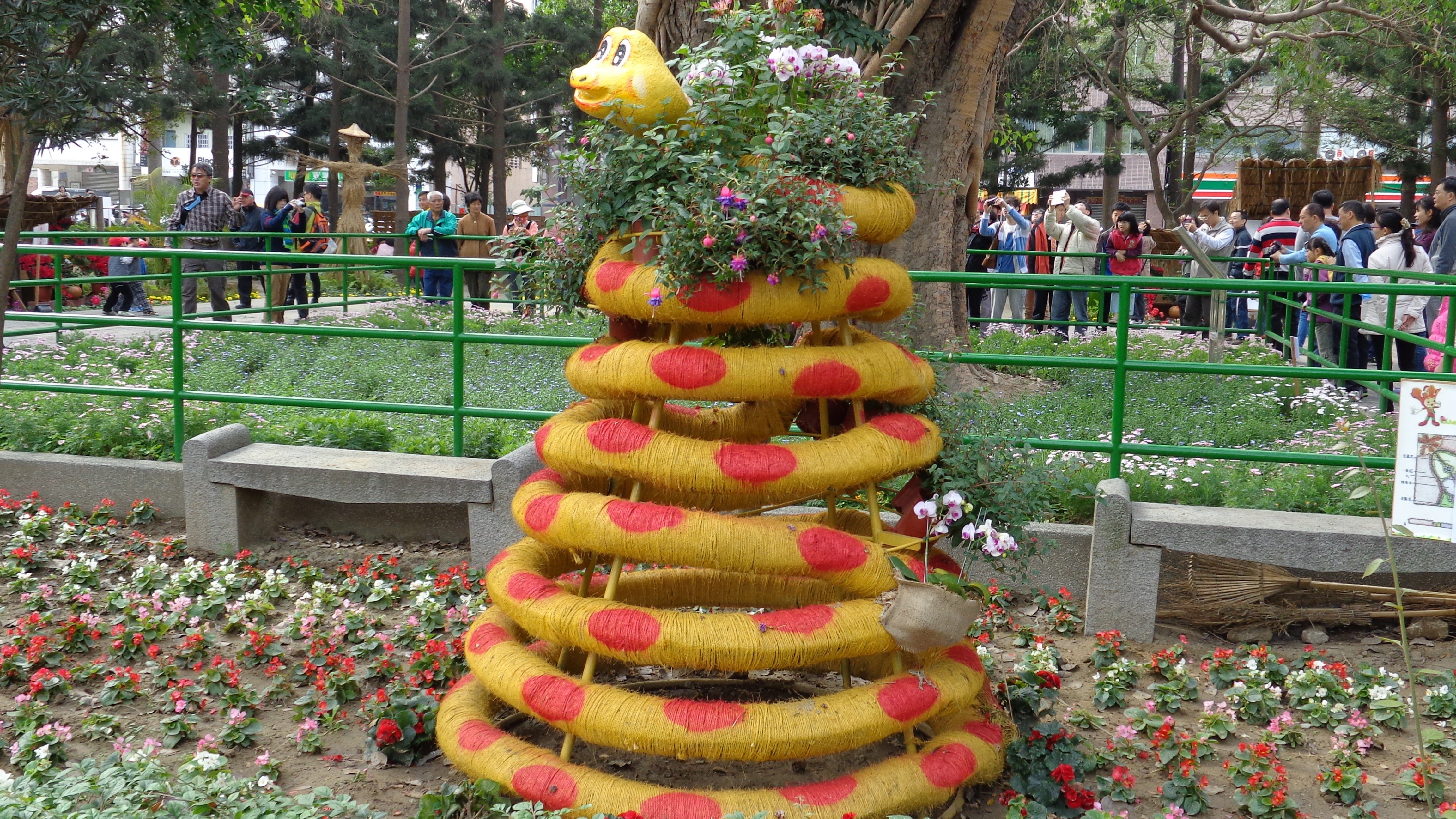 Spiral snake sculpture in park