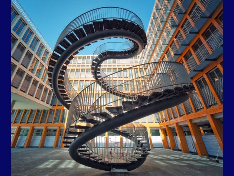 Spiral staircase in modern courtyard