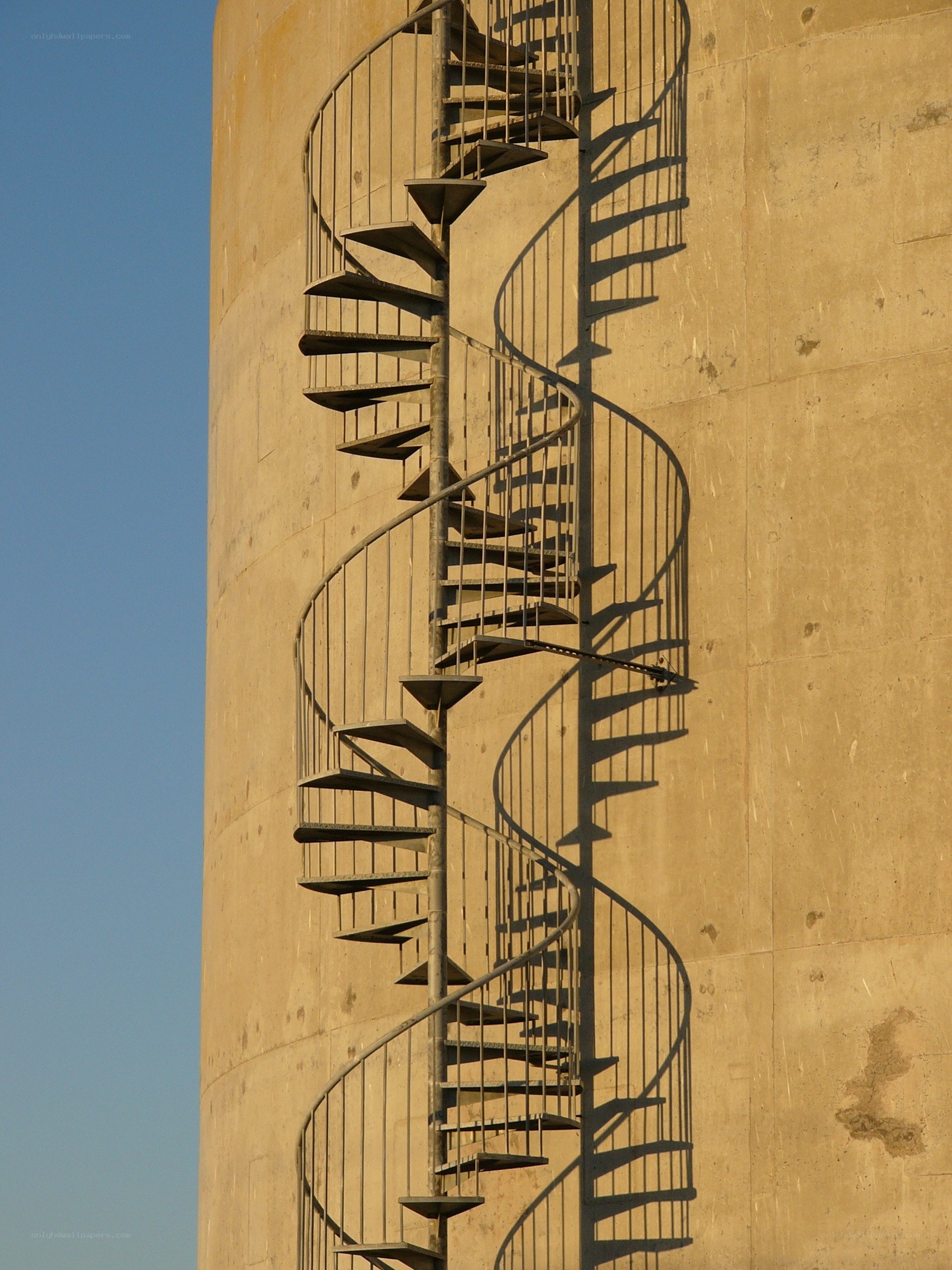spiral staircase on concrete tower